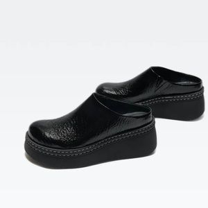 Black patent Mules shoes ..